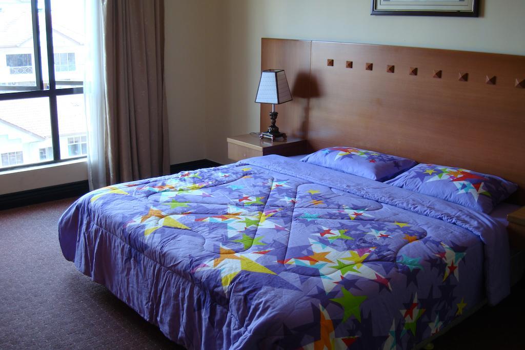 Dorcas Service Apartment - Marina Court Кота-Кинабалу Номер фото