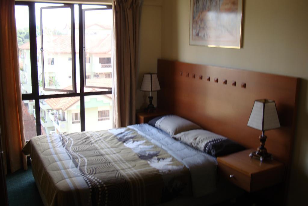 Dorcas Service Apartment - Marina Court Кота-Кинабалу Номер фото